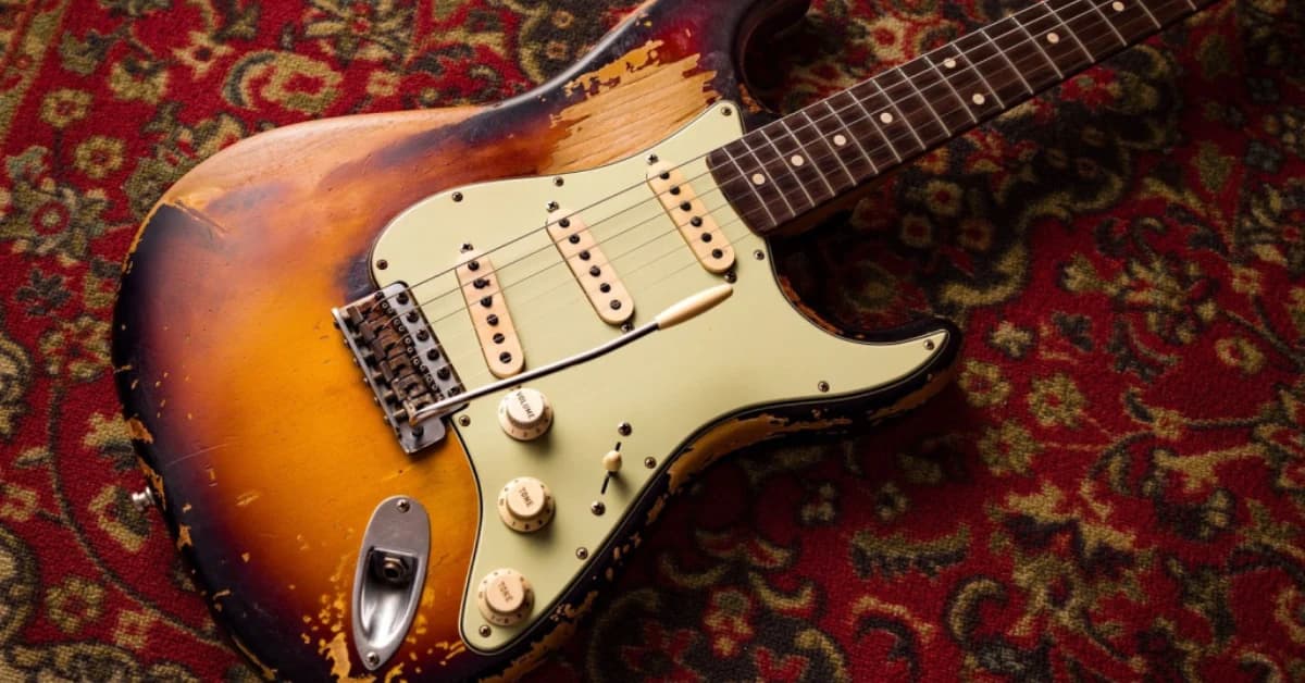 Relic 3-Colour Sunburst Stratocaster body on a red oriental rug — Brice's Custom Shop piece